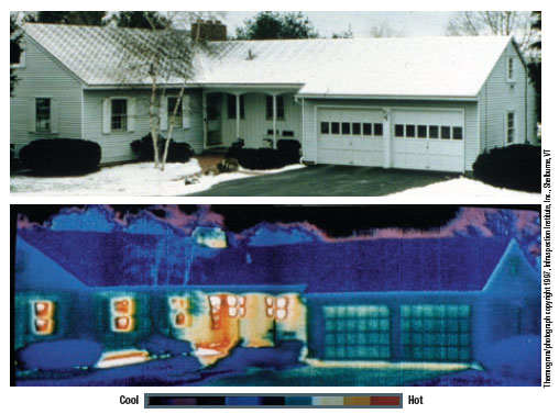 Thermal photograph of ranch style house shows heat escaping through windows, doors, and front porch.