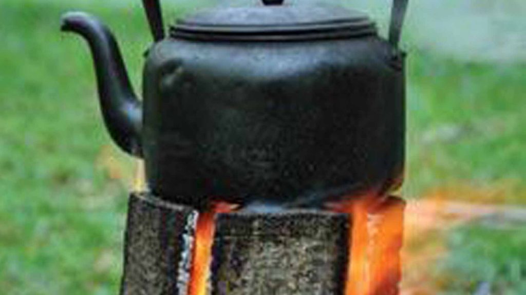 Swedish log candle Backwoods Home Magazine