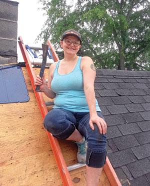 My wife, Sarah, overcame her fear of heights to help with shingle removal.