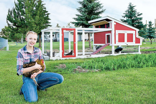 Brianna with her chicken tractor