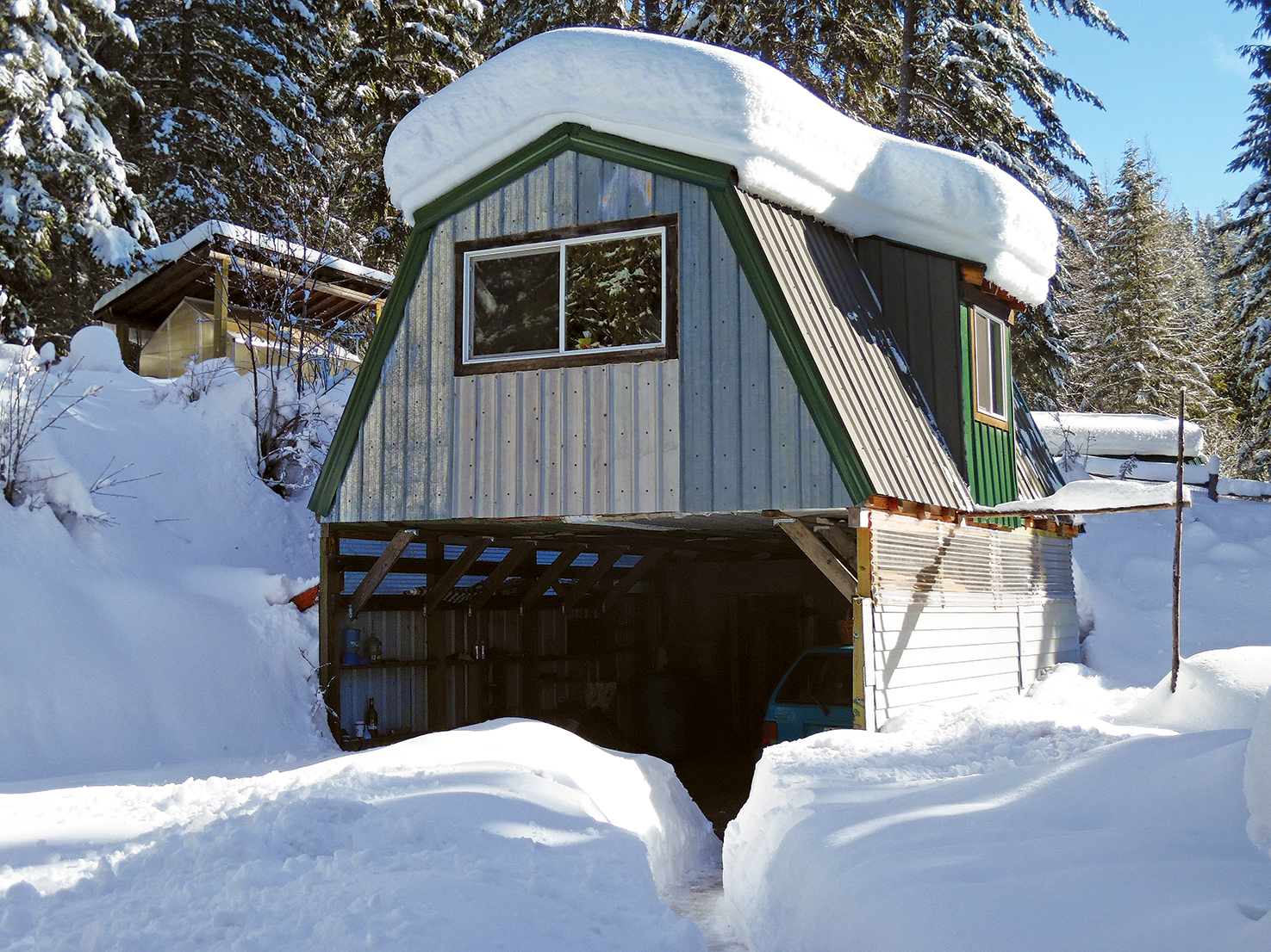 completed garage, bunkhouse, root cellar