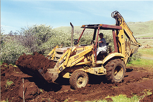 excavating a hole for the root cellar