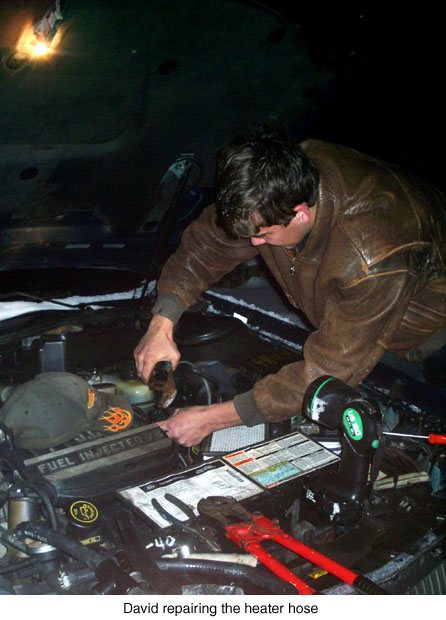 david-repairing-the-heater-hose-jpeg.jpg