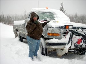 Me shoveling off the truck so David can go plowing