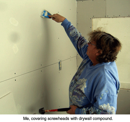 Jackie mudding sheetrock