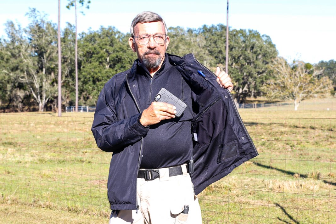 Massad Ayoob wearing a SCOTTeVEST Jacket and pullover