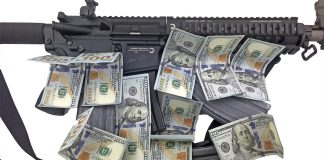 AR-15 Rifle with Magazines and $100 bills