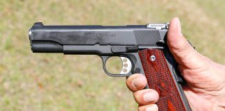 A 1911 pistol in hand